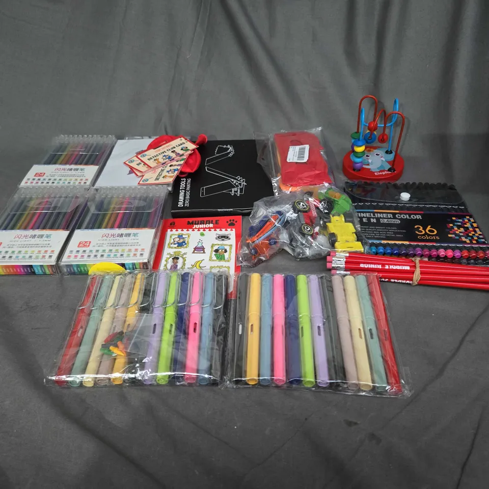 LOT OF ASSORTED TOYS AND GAMES TO INCLUDE PENS, TOY CARS AND DRAWING TOOLS 