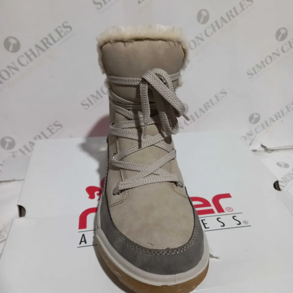 BOXED PAIR OF RIEKER ANTISTRESS WATER RESISTANT WARM HIKING BOOTS, CREAM - SIZE 6.5 