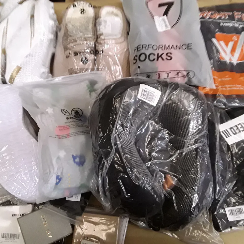 LARGE QUANTITY OF ASSORTED CLOTHING ITEMS TO INCLUDE WOMEN'S FOOTBALL BOOTS, SLIPPERS, SOCKS ECT 