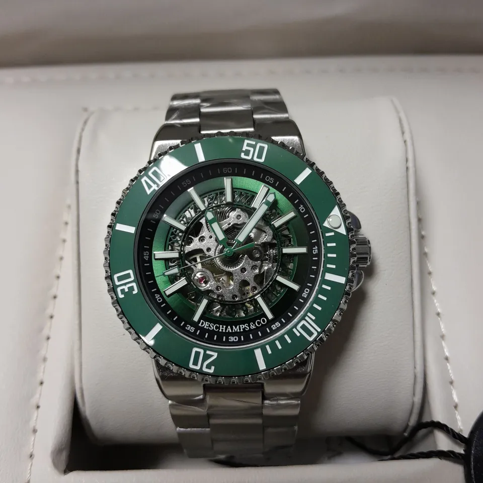 MENS DESCHAMPS & CO SKELETON DIAL STAINLESS STEEL WATCH WITH GREEN FACE IN WOODEN GIFT BOX