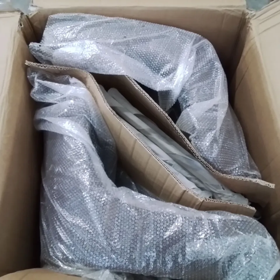 A BOXED PAIR OF BROWN FAUX LEATHER UPHOLSTERED SIDE/DINING CHAIRS