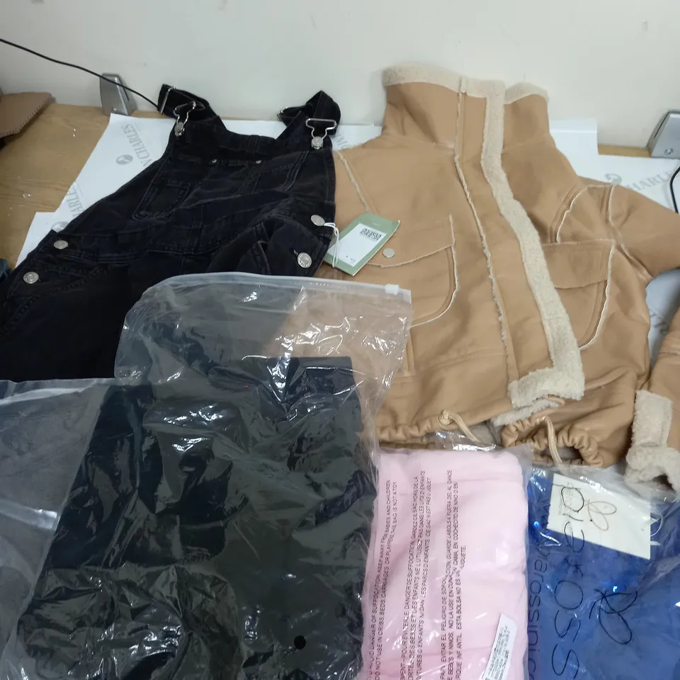 LARGE BOX OF ASSORTED CLOTHING ITEMS IN VARIOUS COLOURS AND SIZES INCLUDING TROUSERS , TOPS AND JUMPERS 