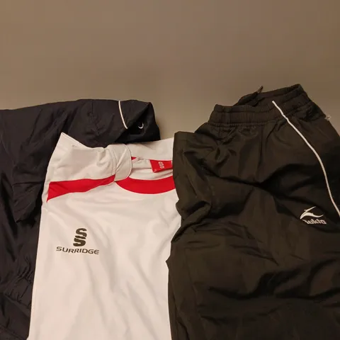 APPROXIMATELY 10 ASSORTED SPORTS CLOTHING PRODUCTS IN VARIOUS SIZES TO INCLUDE TRACKSUITS, SHORTS, TSHIRTS ETC
