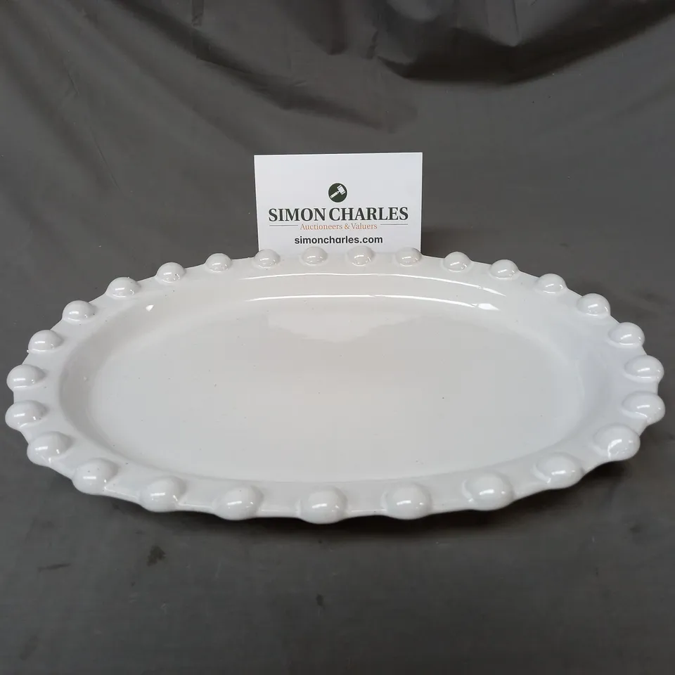 BOXED TRULY OVAL POM POM SERVING PLATTER IN PALE GREY