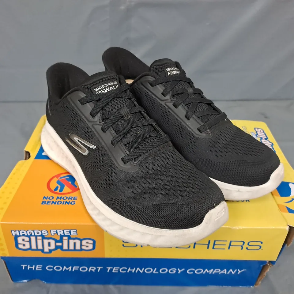 BOXED PAIR OF SKECHERS GO WALK SLIP INS IN BLACK - SIZE 5.5