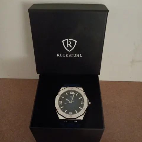 RUCKSTUHL SILVER COLOUR WRISTWATCH WITH NAVY RUBBER STRAP