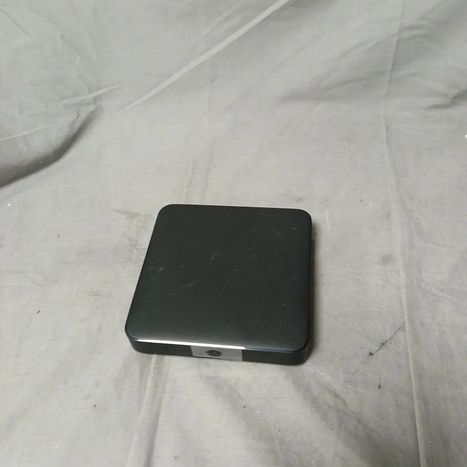 BLACK STREAMING/MEDIA BOX – MODEL UZW045-TT6 . NO CHARGER INCLUDED .