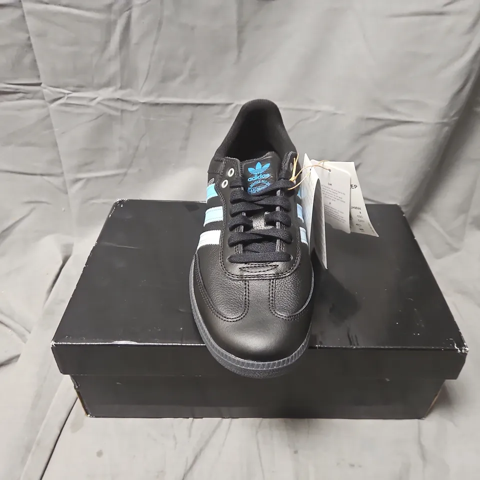 BOXED ADIDAS BLACK SHEEP SNEAKERS – UK 9 (US 9.5), BLACK WITH LIGHT BLUE STRIPES