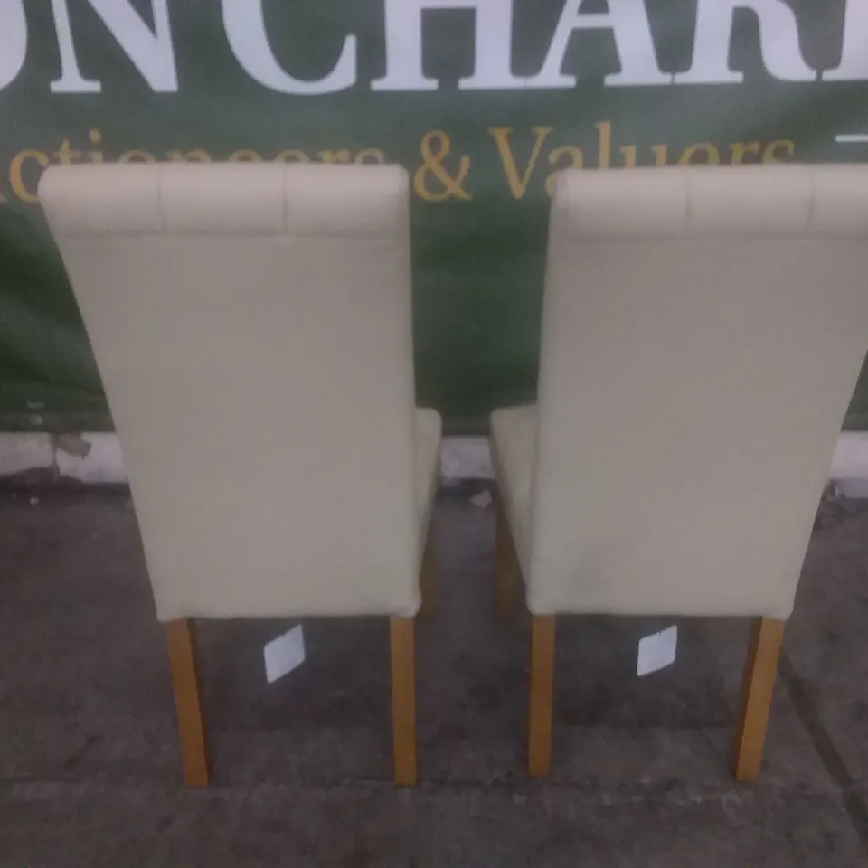 SET OF 2 NEW IVORY LEATHER DINING CHAIRS (OAK LEG)