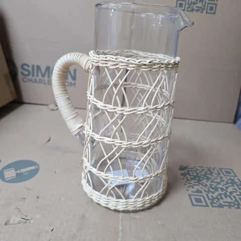 LOT OF 4 GISELA GRAHAM LARGE GLASS JUGS WITH RATTAN STYLE DECOR