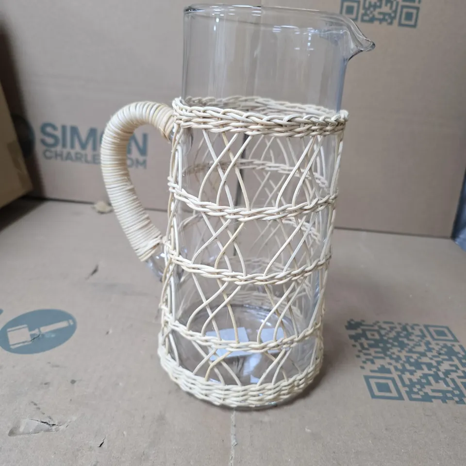 LOT OF 4 GISELA GRAHAM LARGE GLASS JUGS WITH RATTAN STYLE DECOR