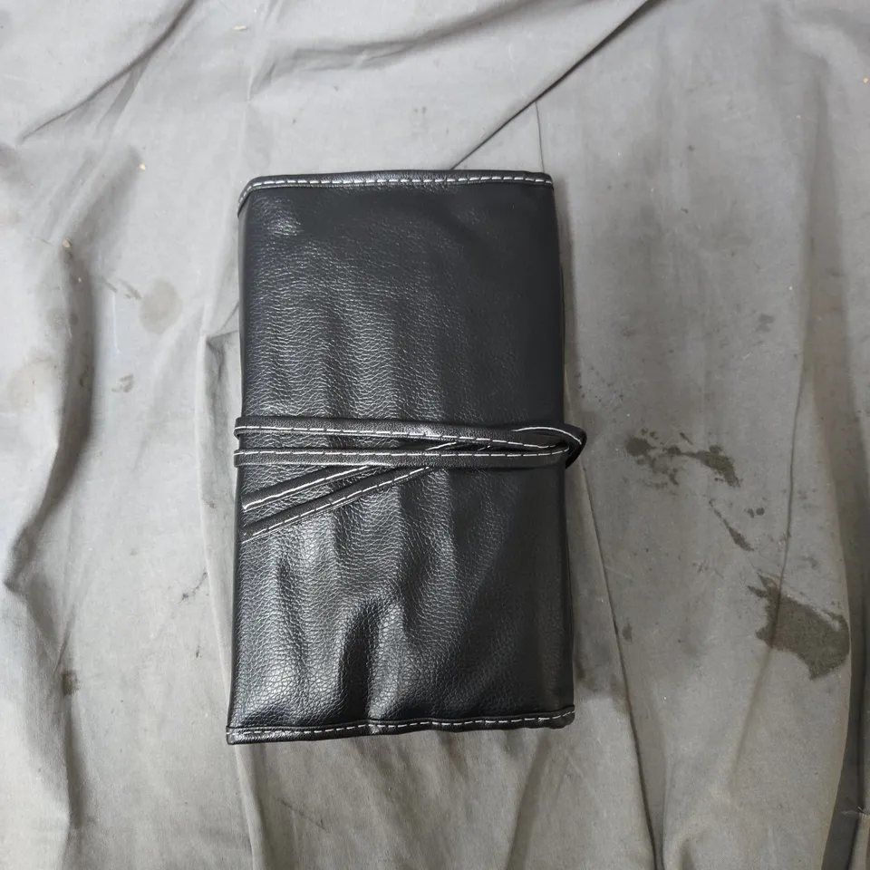 MAKEUP BRUSH SET IN BLACK LEATHER ROLL CASE, BOX OF APPROXIMATELY 10