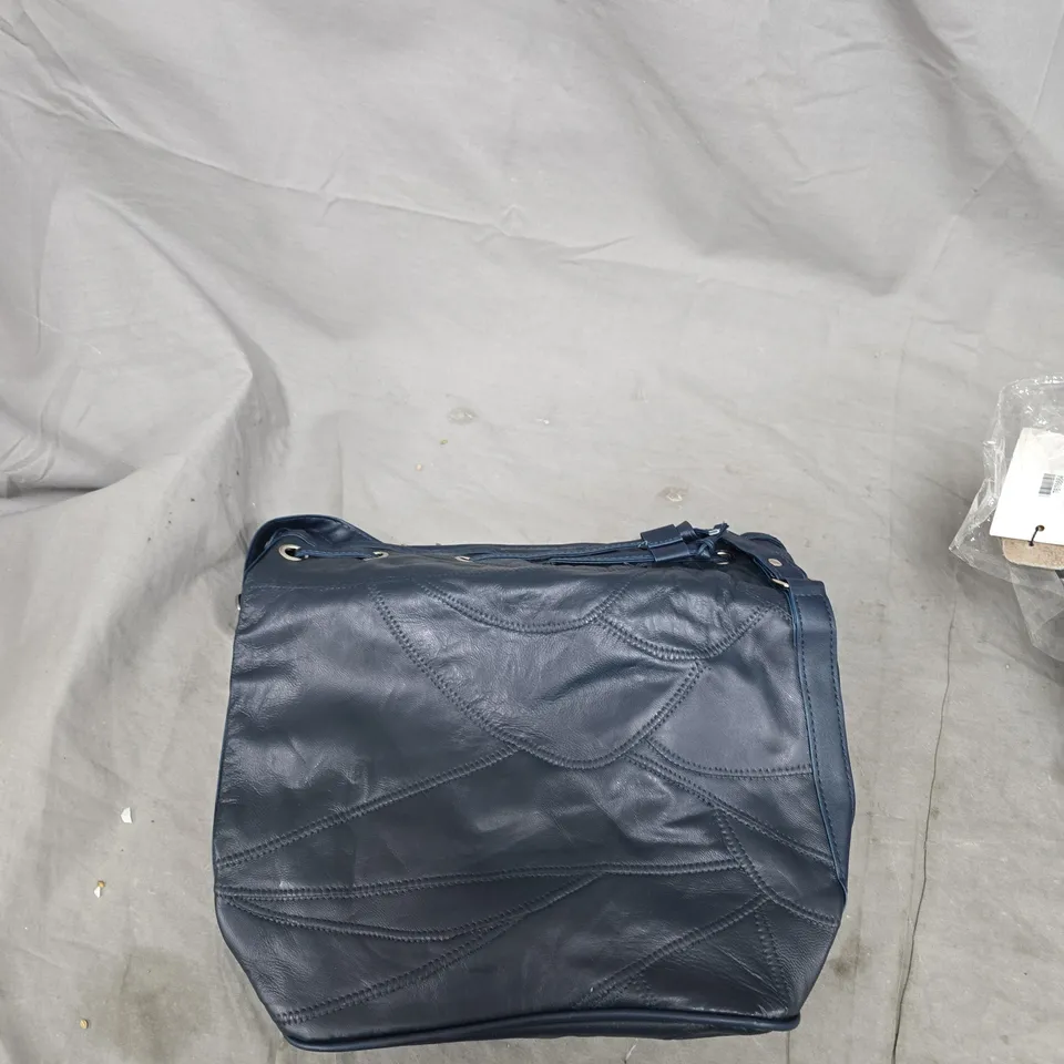 NAVY QUILTED SHOULDER BAG – GROMMET EYELET DETAIL 