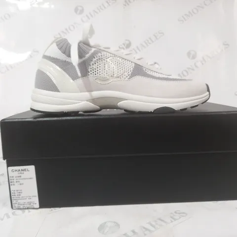 BOXED PAIR OF CHANEL SNEAKERS IN GREY/WHITE EU SIZE 38