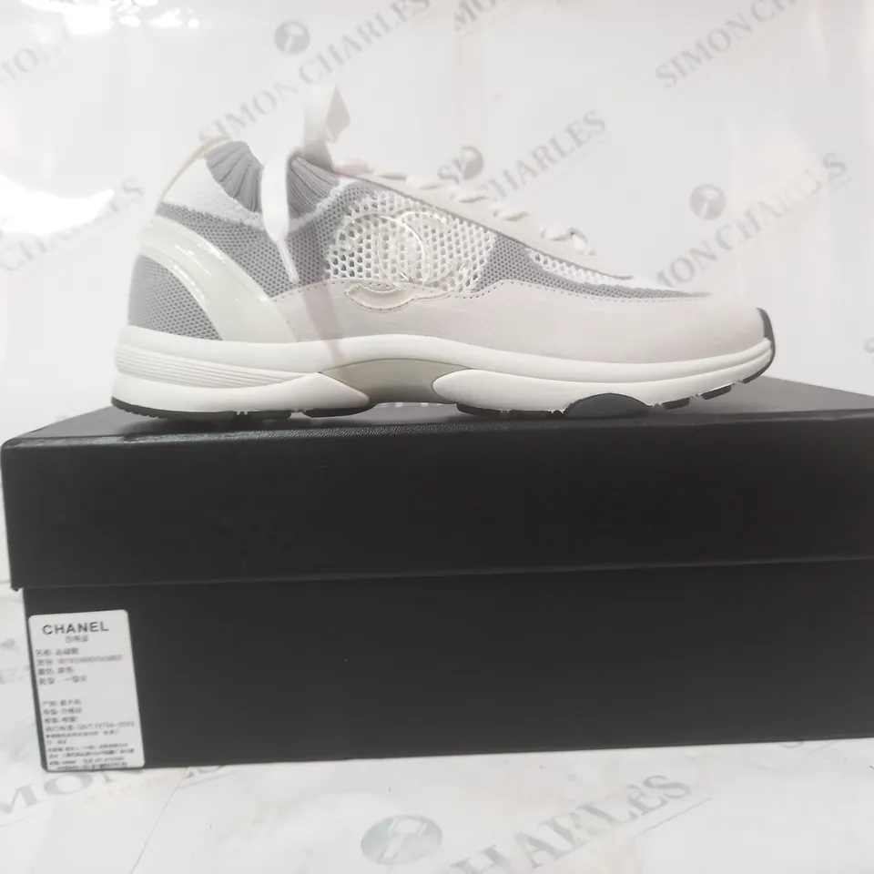 BOXED PAIR OF CHANEL SNEAKERS IN GREY/WHITE EU SIZE 38