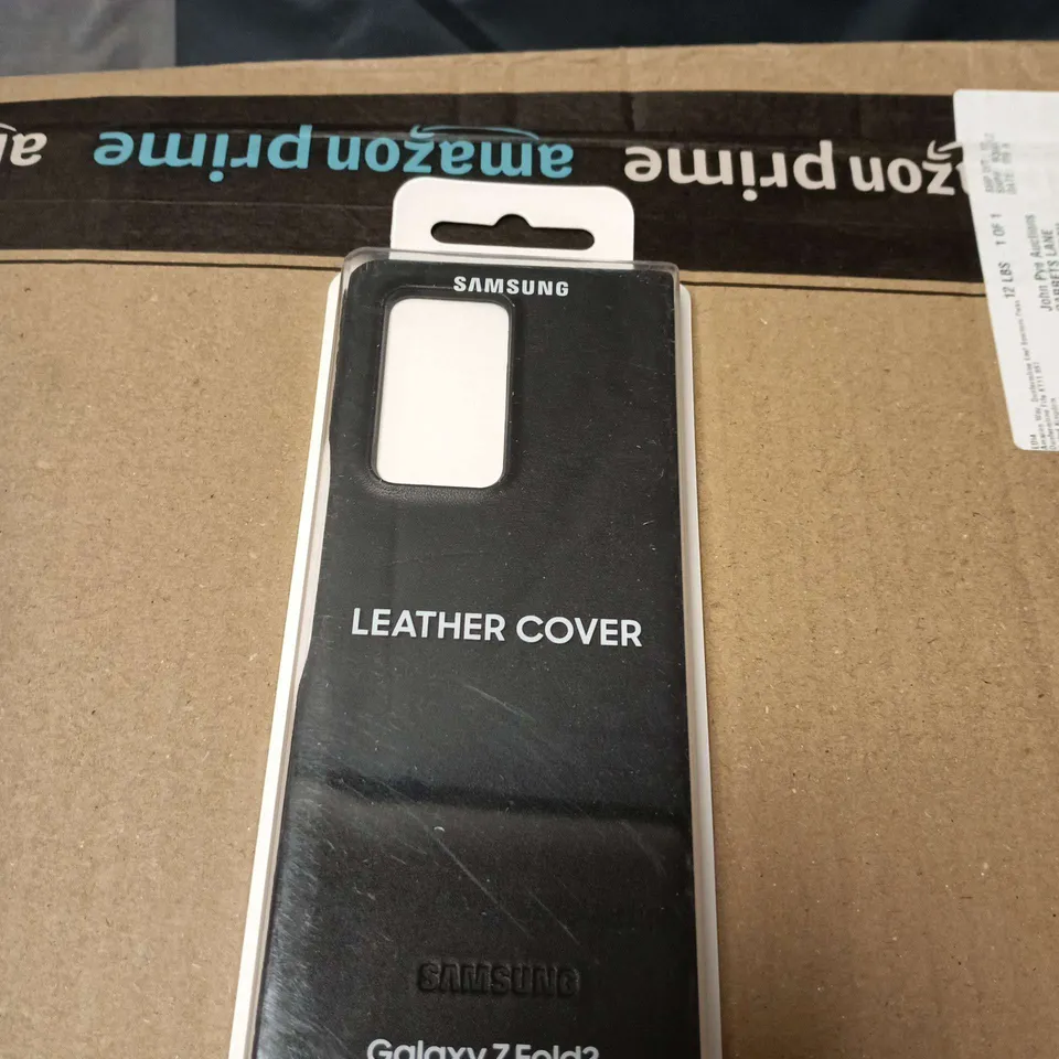 BOX OF APPROXIMATELY 50 SAMSUNG LEATHER COVER PHONE CASES 