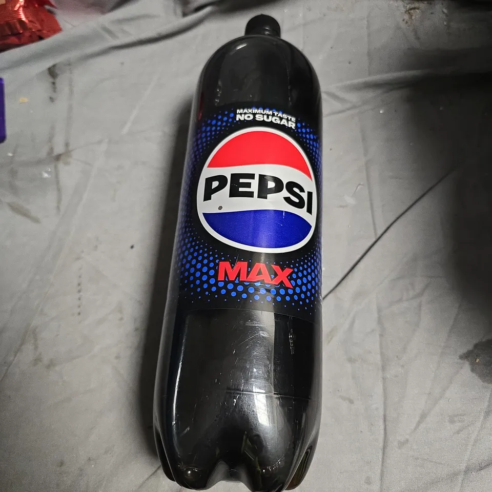 APPROXIMATELY 12 ASSORTED FOOD ITEMS INCLUDING PEPSI MAX , DAIRY MILK AND MARYLAND COOKIES 