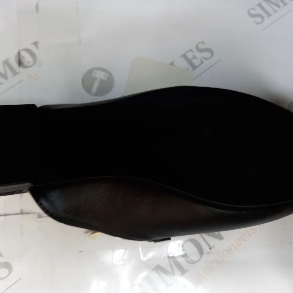PAIR OF KASARA BAR MULE SLIP-ON SHOES IN BLACK SIZE 4