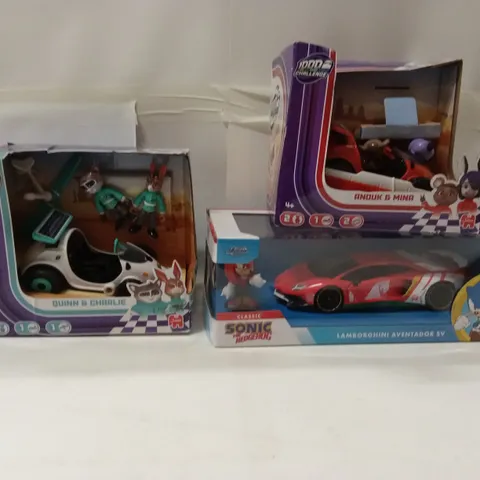 BOX OF ASSORTED KIDS TOYS AND PRODUCTS TO INCLUDE;QUINN AND CHARLIE TOY,SONIC THE HEDGEHOG LAMBORGHINI AVENTADOR CAR,ETC