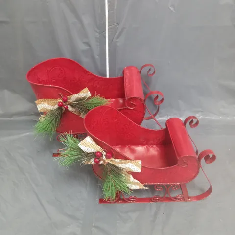 SET OF 2 CHRISTMAS METAL SLEIGHS IN RED