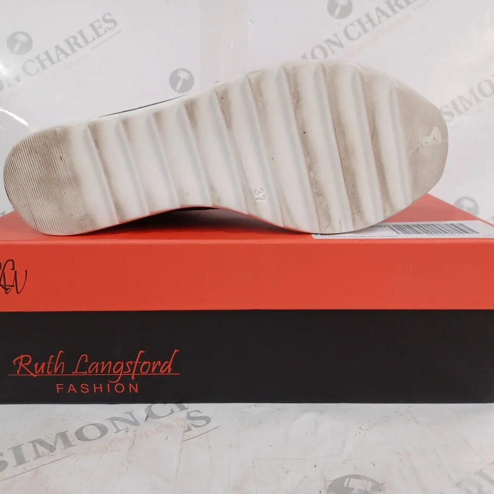 BOXED PAIR OF RUTH LANGSFORD WEDGE TRAINERS IN NAVY SIZE 4