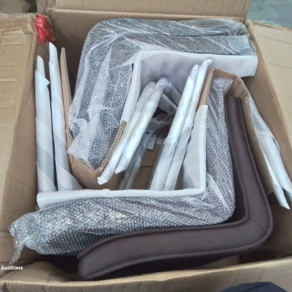 A BOXED SET OF 4 FAUX LEATHER UPHOLSTERED DINING CHAIRS (1 BOX)