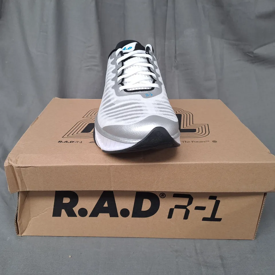 BOXED PAIR OF R.A.D R-1 TRAINERS IN WHITE/METALLIC SILVER UK SIZE 9