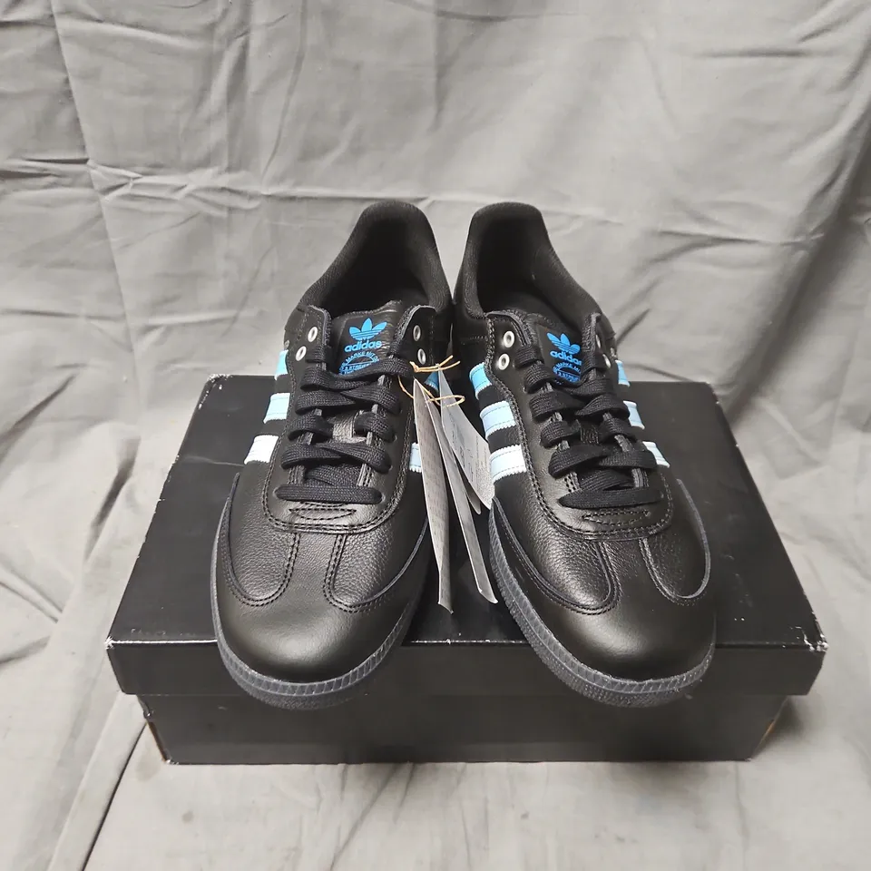 BOXED ADIDAS BLACK SHEEP SNEAKERS – UK 9 (US 9.5), BLACK WITH LIGHT BLUE STRIPES