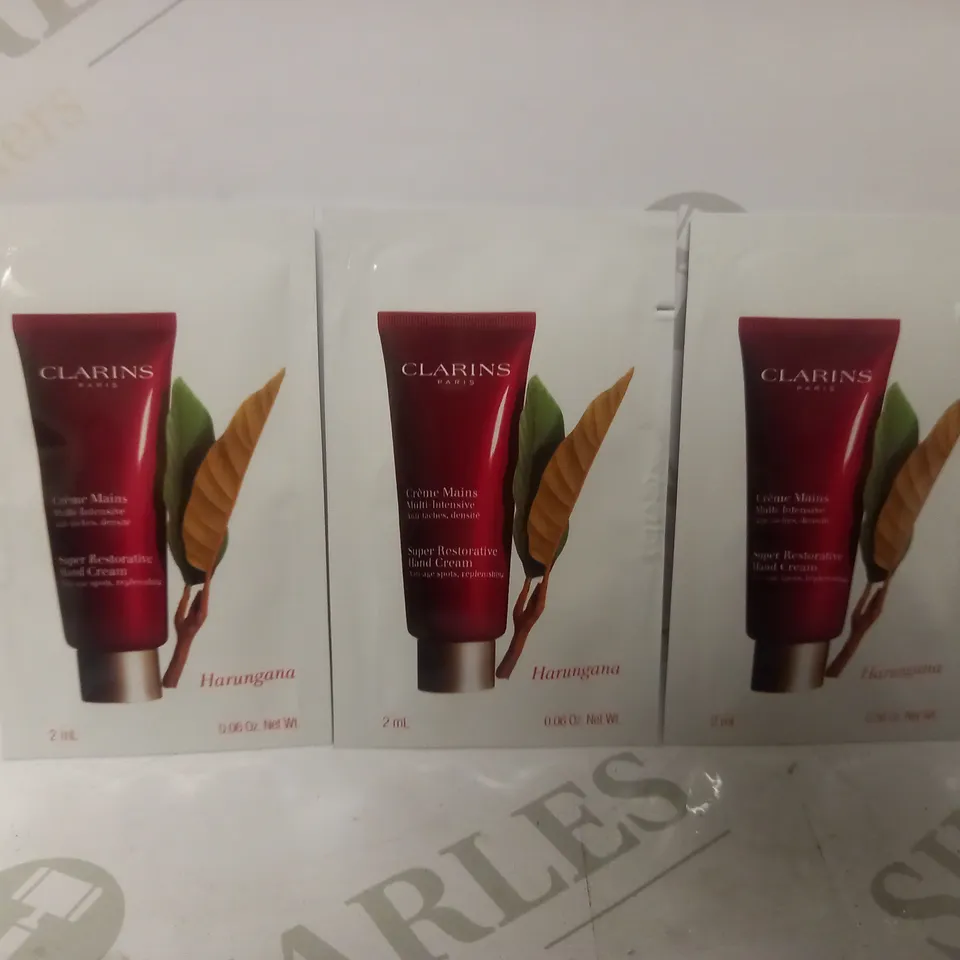 BOX OF APPROX 500 CLARINS SUPER RESTORATIVE HAND CREAM 2ML