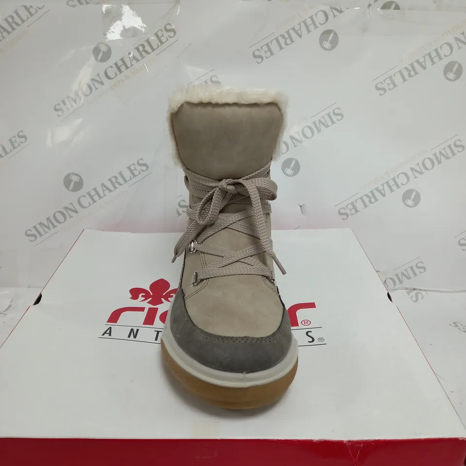BOXED PAIR OF RIEKER ANTISTRESS WATER RESISTANT WARM HIKING BOOTS, CREAM - SIZE 6.5 