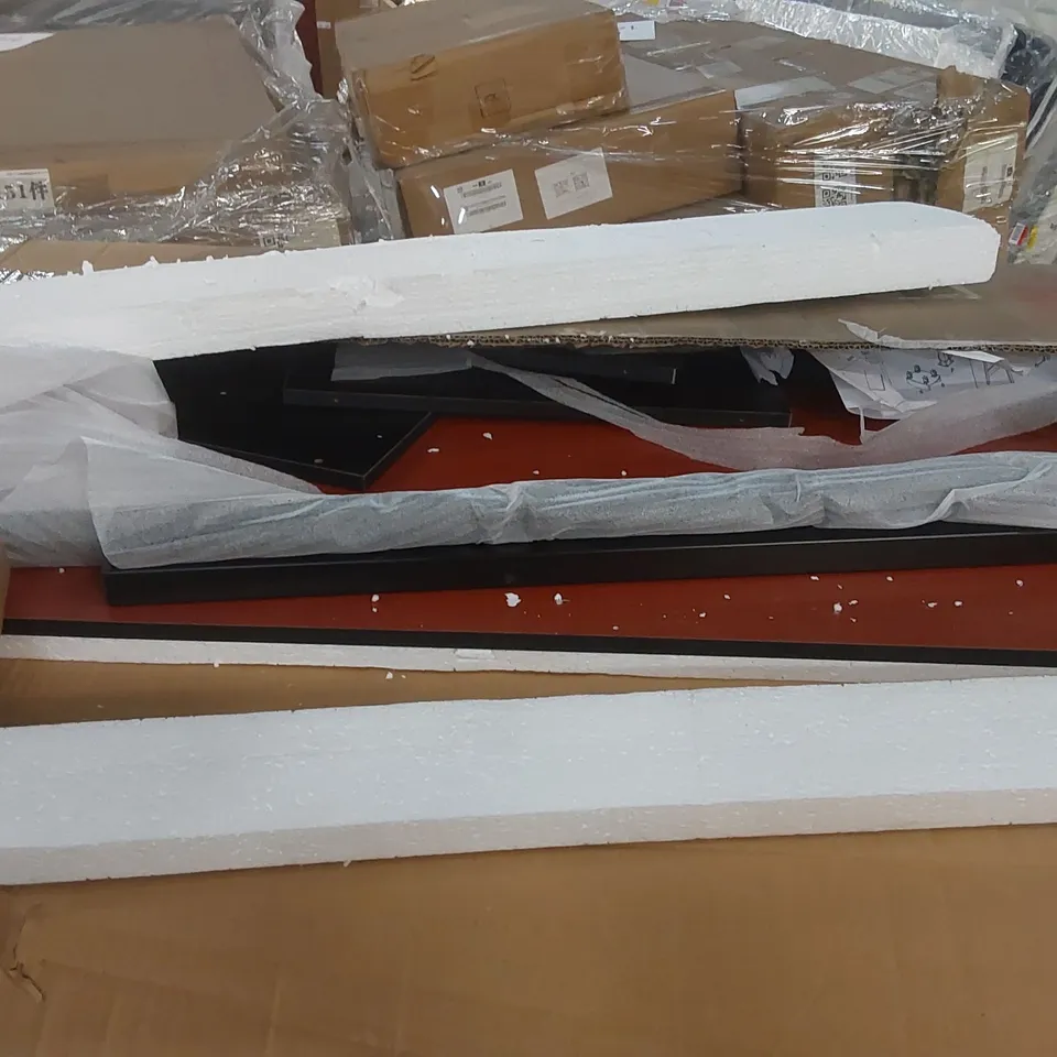 PALLET CONTAINING A LARGE QUANTITY OF DESKS ECT