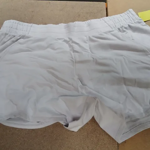 APPROXIMATELY 12 PAIRS OF ALL IN MOTION LAVENDER SHORTS