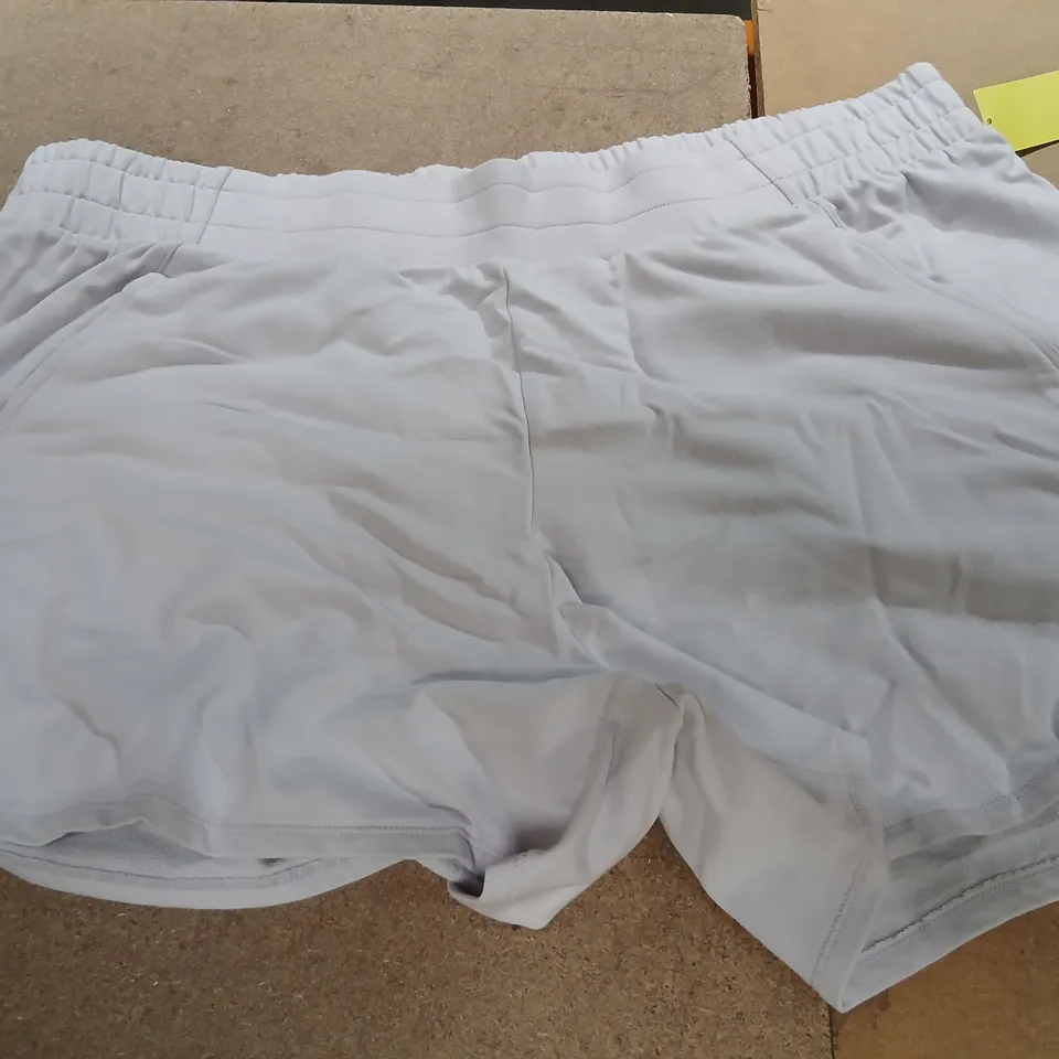 APPROXIMATELY 12 PAIRS OF ALL IN MOTION LAVENDER SHORTS