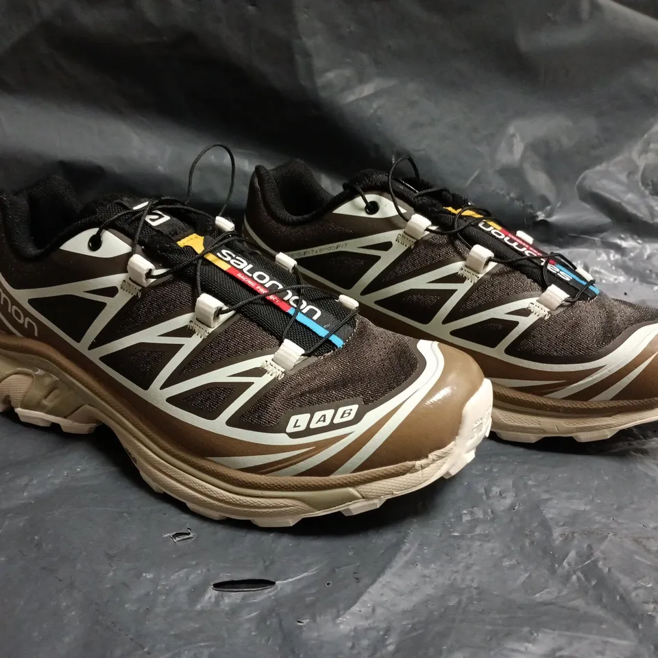 PAIR OF SALOMON TRAINERS IN BROWN SIZE UK 5.5