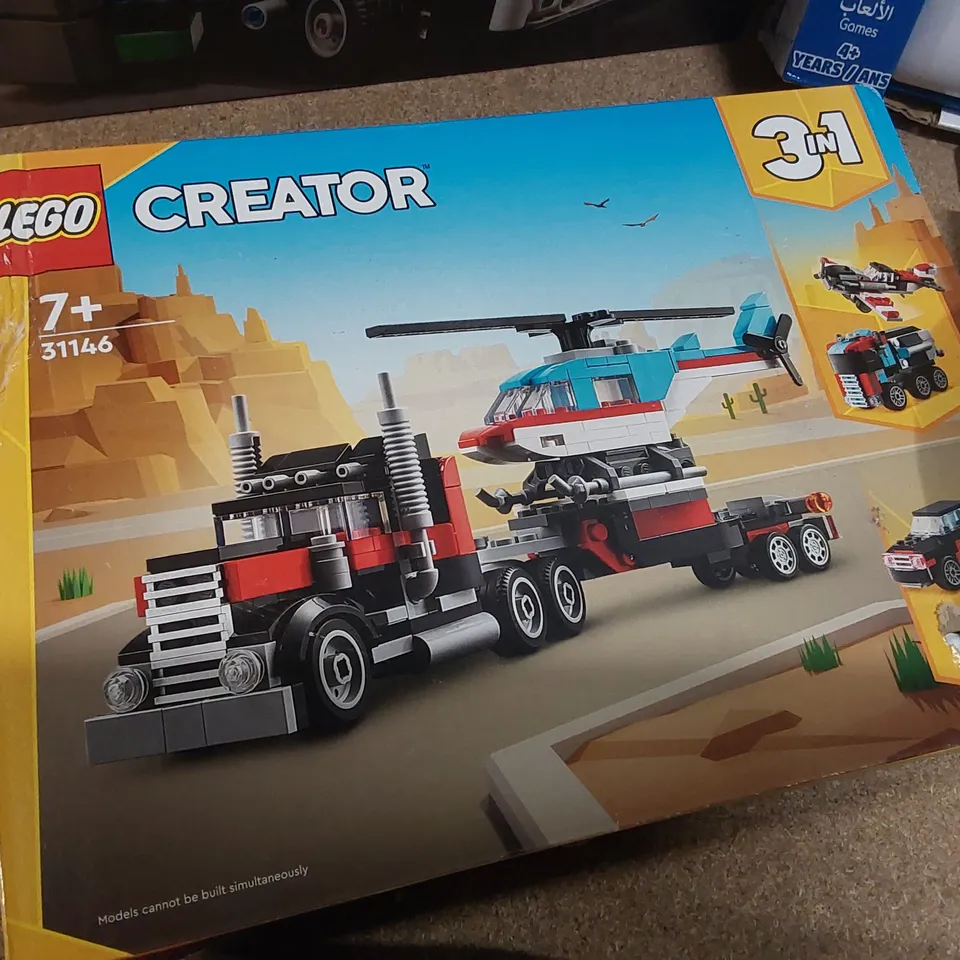 BOX OF APPROXIMATELY 10 BOXED TOYS TO INCLUDE: LEGO TECHNIC GARBAGE TRUCK, KIDS LAPTOP, TWISTABLES CRAYONS, MY DOG PIGGY BANK ECT.