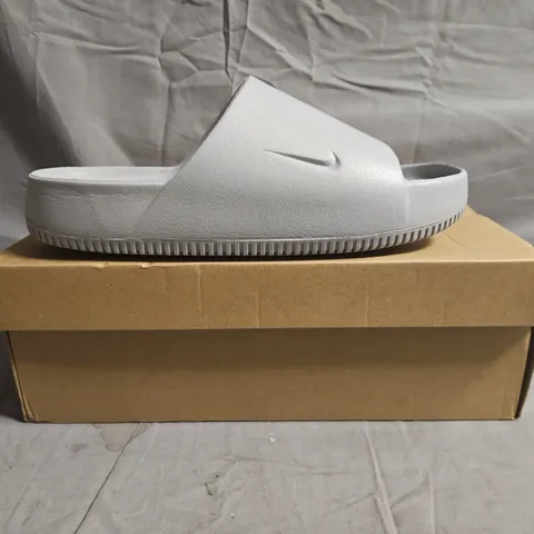 BOXED PAIR OF NIKE CALM SLIDERS IN WOLF GREY SIZE UK 10