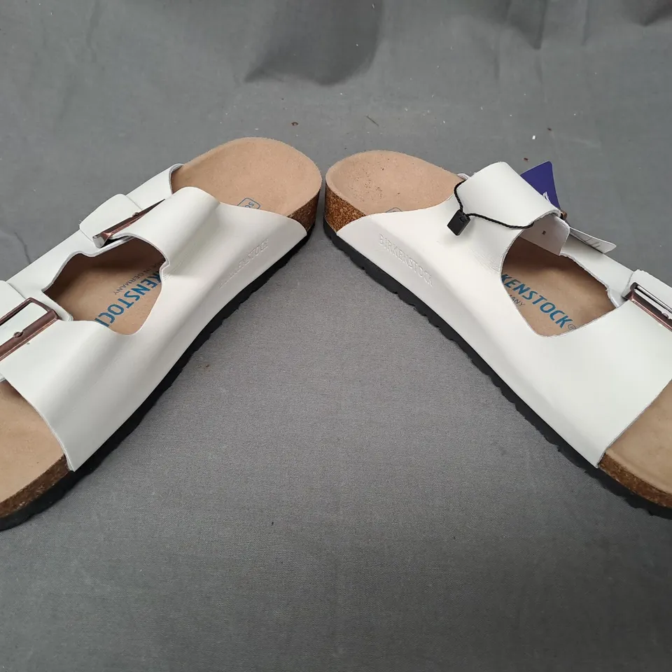 PAIR OF BIRKENSTOCK OPEN TOE SANDALS IN WHITE EU SIZE 41
