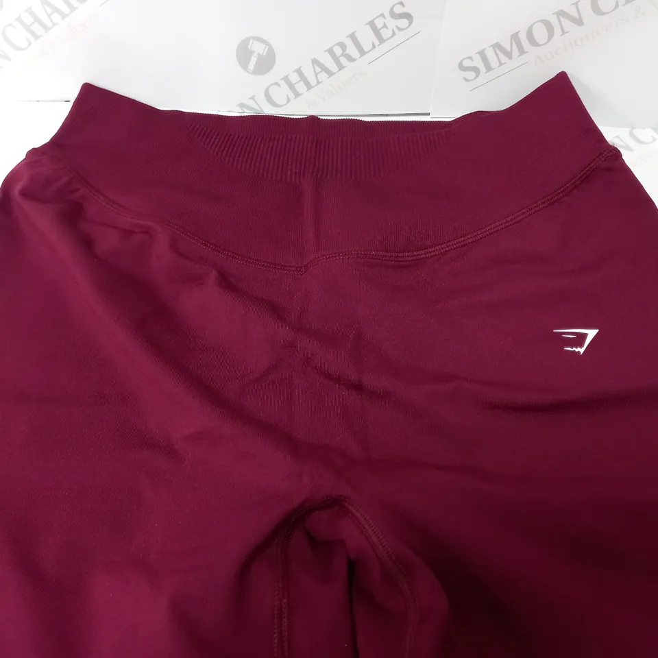 GYMSHARK SWEAT SEAMLESS SHORTS IN PLUM PINK - LARGE