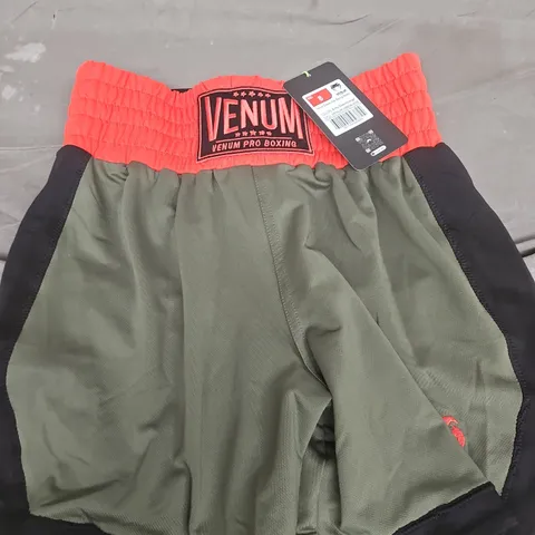 VENUM CLASSIC KIDS BOXING SHORTS – ARMY GREEN/ORANGE, SIZE UK 8