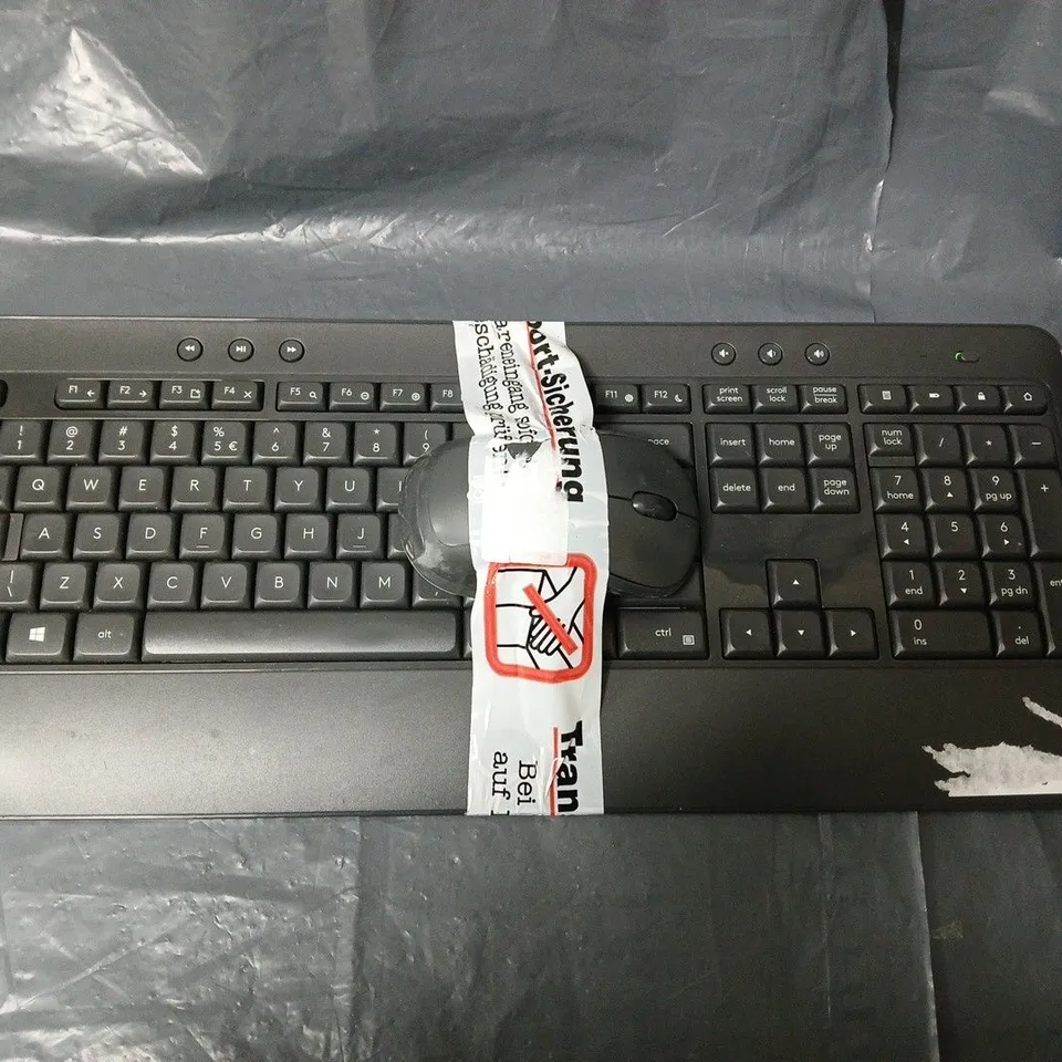 BLACK FULL-SIZE PC KEYBOARD AND MOUSE