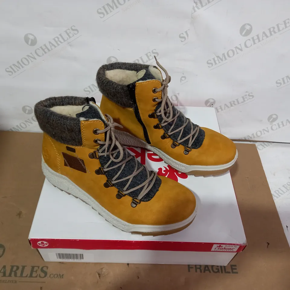 BOXED PAIR OF RIEKER BOOTS - SIZE 40