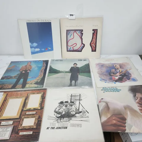 8 X VINYL RECORD LPS.