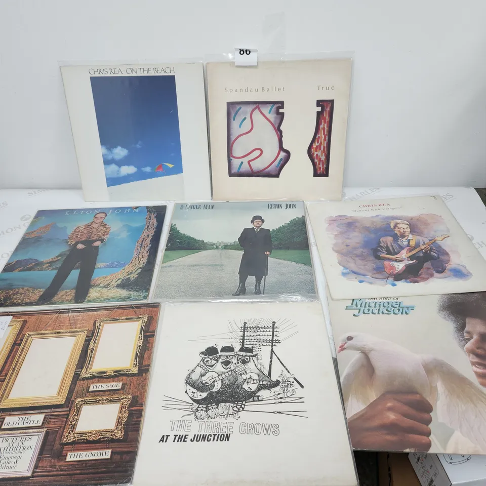 8 X VINYL RECORD LPS.