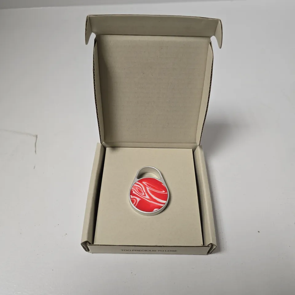 BOXED GOMI ITEM TRACKER TAG IN RED SWIRL