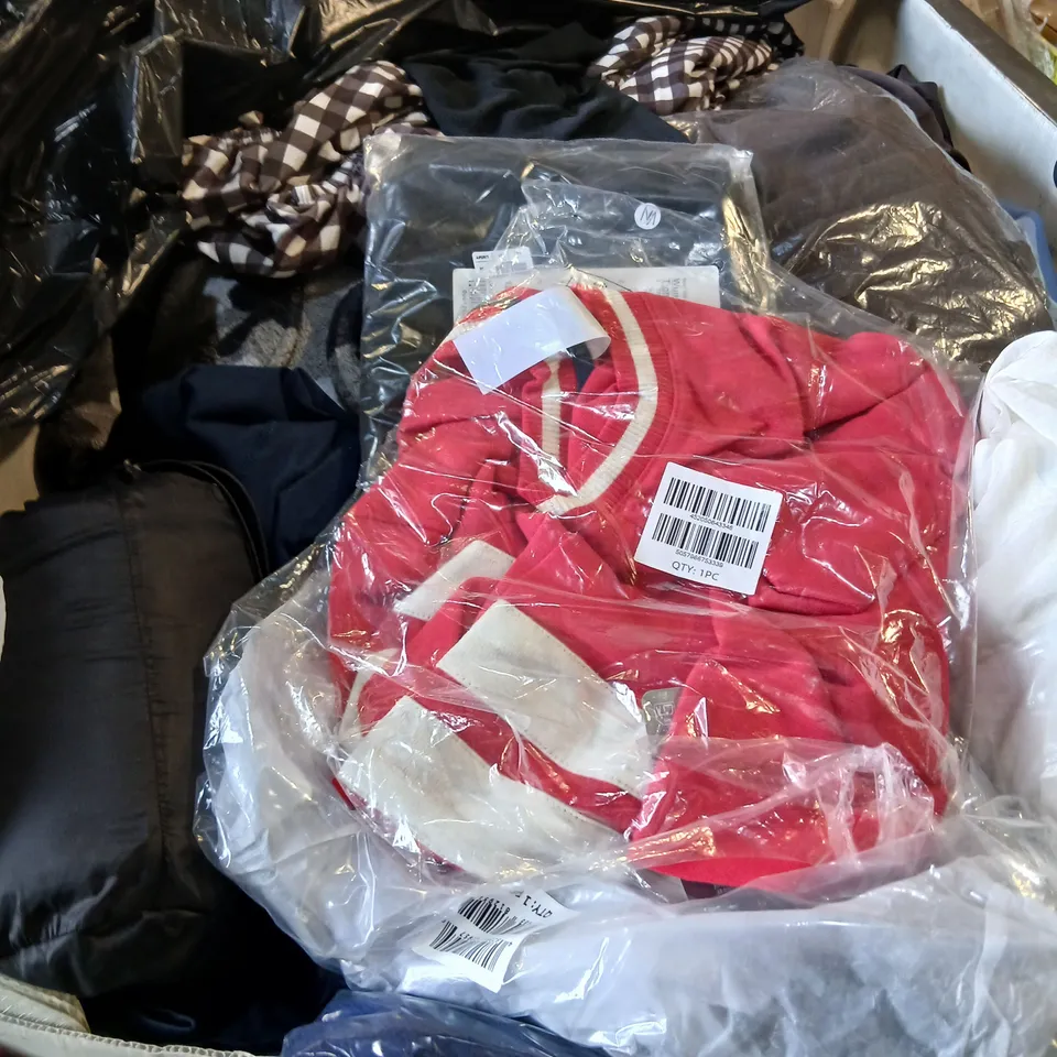 LARGE CAGE OF ASSORTED UNPROCESSED CLOTHING TYPICALLY AROUND 350 ITEMS