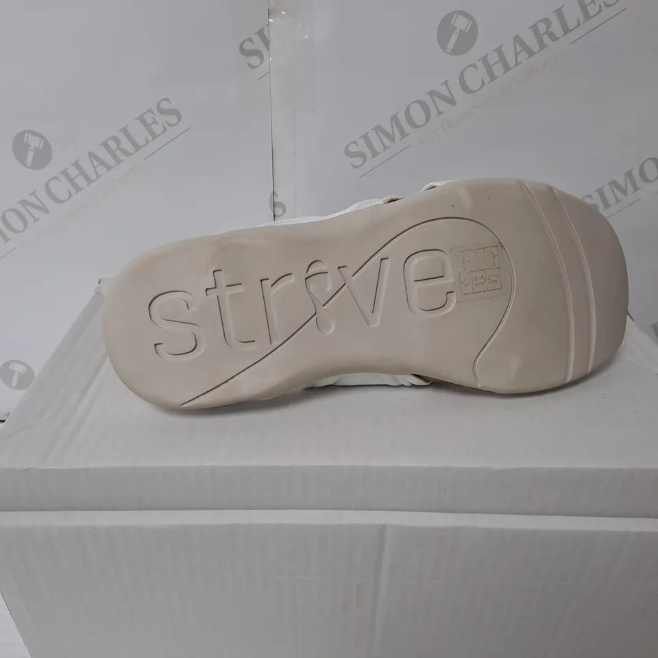 BOXED PAIR OF STRIVE SICILY ALIDER SANDALS IN WHITE SIZE 6