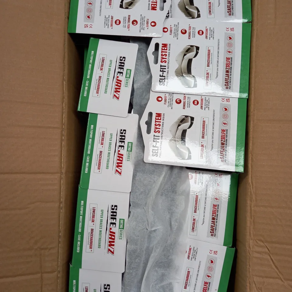 BOX OF APPROXIMATELY 50 SAFEJAWS ORTHO CRYSTAL CLEAR BRACES MOUTHGUARD