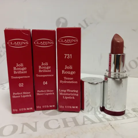 LOT OF 3 CLARINS JOLI ROUGE LIPSTICKS IN ASSORTED COLOURS