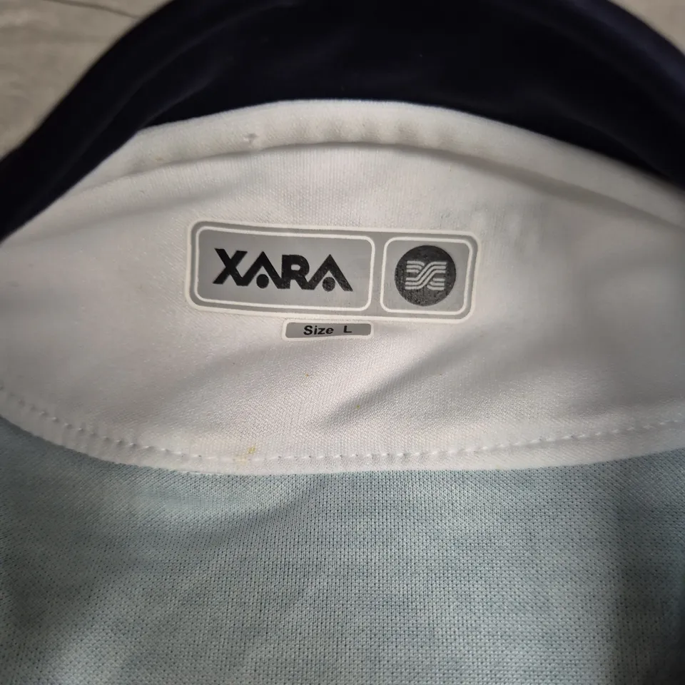 XARA FOOTBALL JERSEY SIZE L – LIGHT BLUE & WHITE PANEL WITH DPC PRINT 