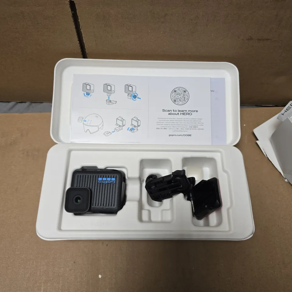 GOPRO HERO ACTION CAMERA WITH PROTECTIVE HOUSING AND MOUNTING ACCESSORIES
